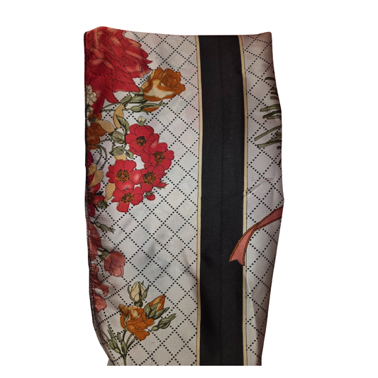 Floral patterned fabric with a black stripe on a white background