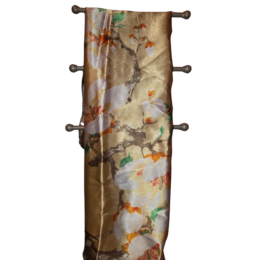 Decorative wall hanging with floral pattern on a white background