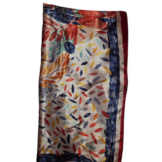 Colorful scarf with leaf pattern on a white background