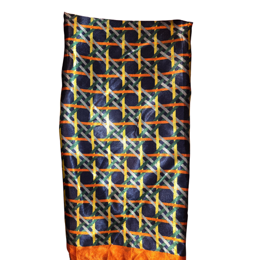 Colorful patterned fabric with geometric design on a white background