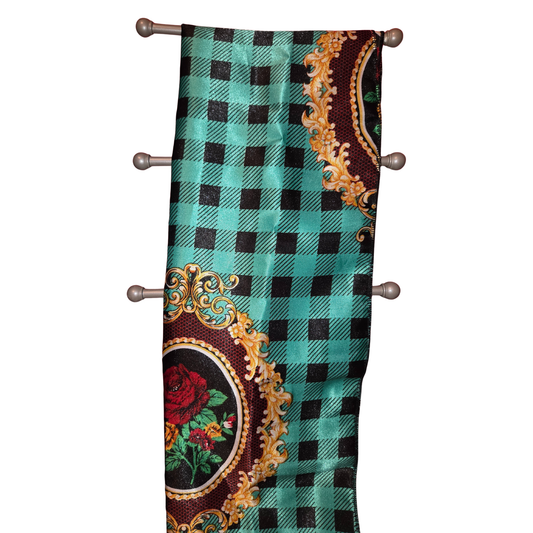 Decorative tie with checkered pattern and floral designs on a white background