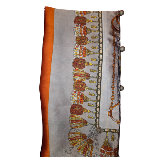 Decorative fabric with intricate patterns on a white background